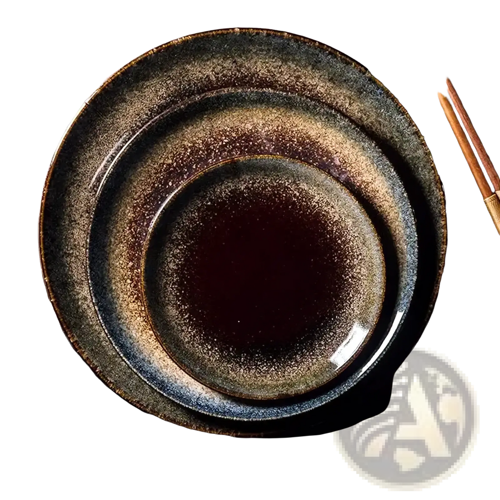 Set of three stacked japanese ceramic dinner plates with rustic speckled glaze in dark brown and muted blue tones