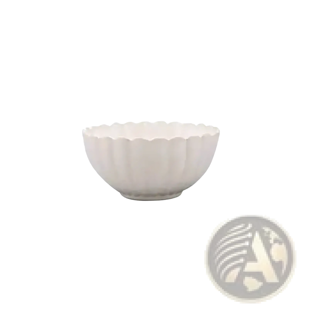 A white ceramic bowl with a fluted petal-like rim and vertical ridges from a Japanese ceramic dinnerware set