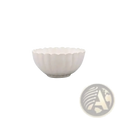 A white ceramic bowl with a fluted petal-like rim and vertical ridges from a Japanese ceramic dinnerware set