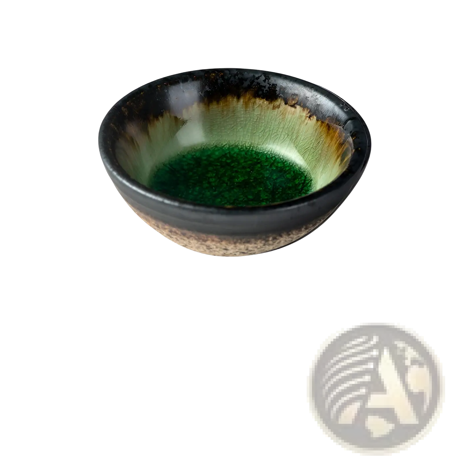 A handcrafted Japanese ceramic small plate with a glossy black rim and vibrant green and brown speckled glaze