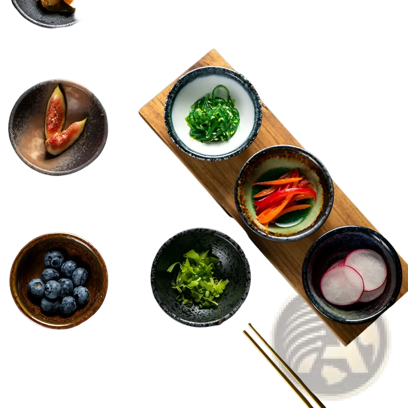 Set of Japanese ceramic small plates with rustic speckled glaze in earthy tones arranged on a wooden tray