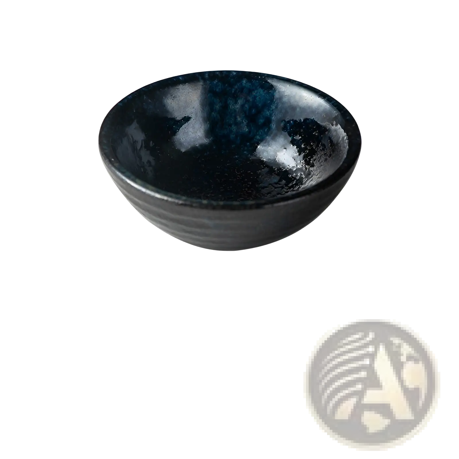 A glossy black ceramic Japanese small plate with a rustic speckled glaze and subtle horizontal ridges around the rim