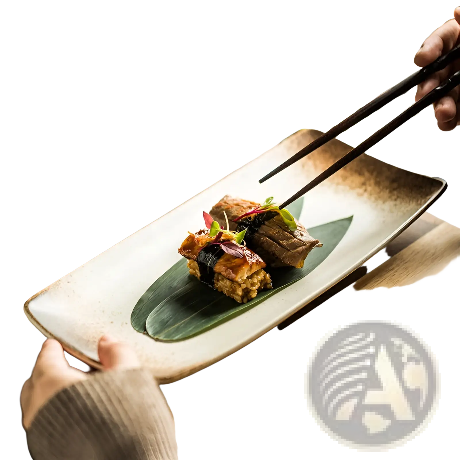 A rectangular Japanese ceramic sushi plate with speckled off-white glaze holding grilled fish on a green leaf