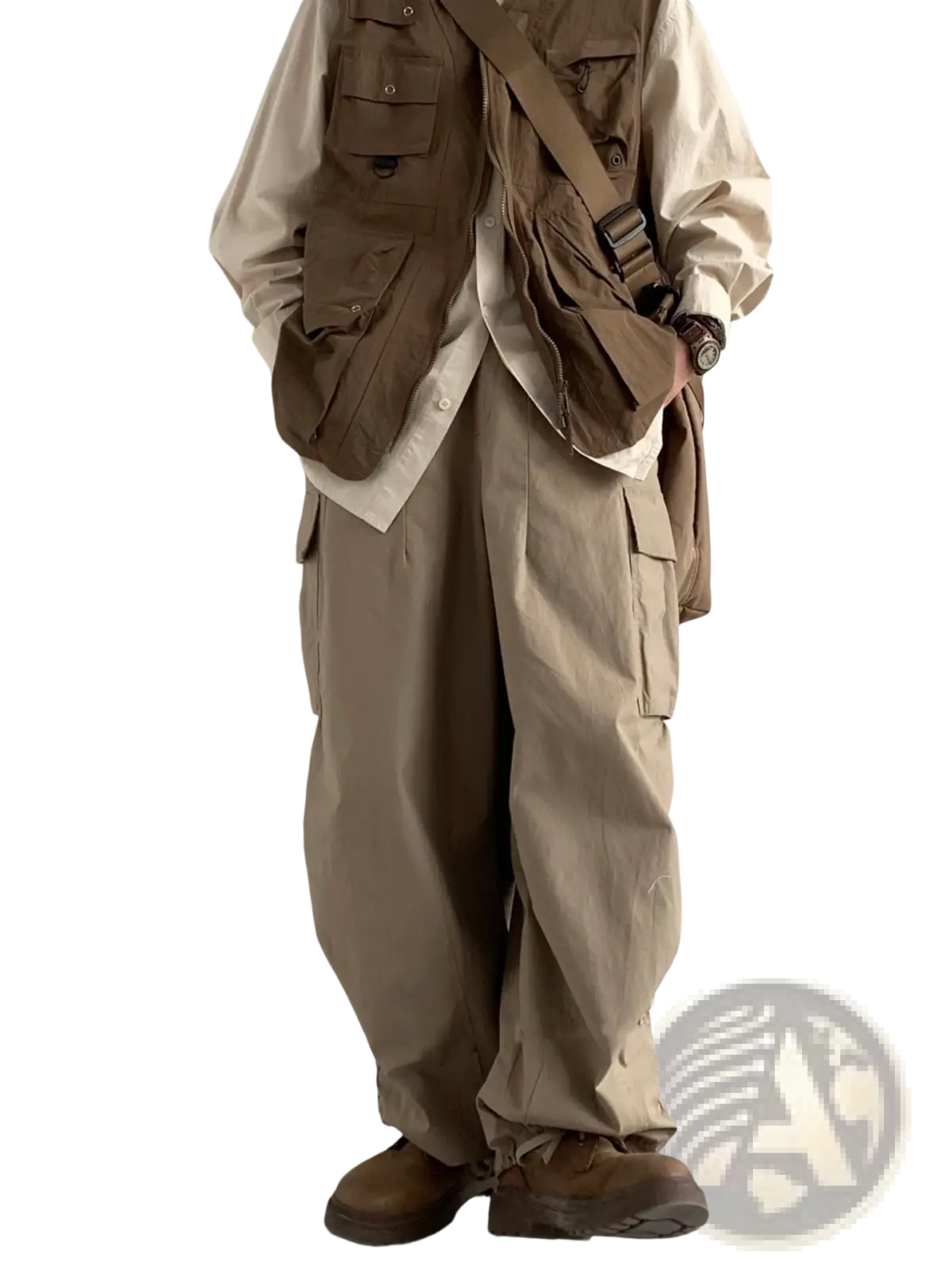 Tan utility vest with multiple pockets and adjustable shoulder strap paired with japanese retro loose cargo trousers