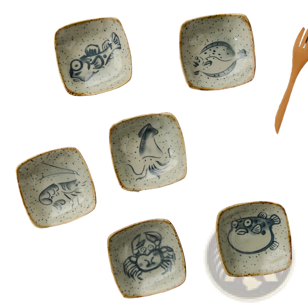 Japanese style ceramic sea creature sauce dish set of five square dishes with blue hand-painted designs and brown rims
