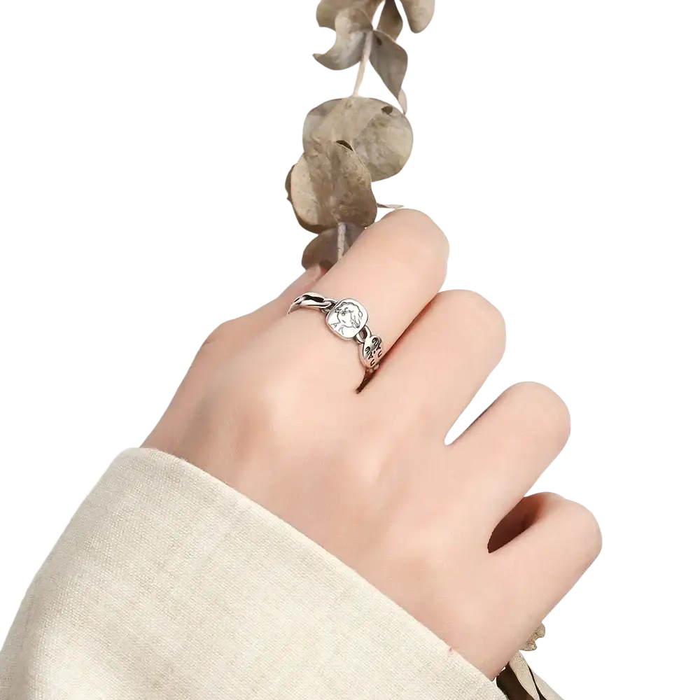 Jemmin sterling silver adjustable face ring with circular engraved design and delicate twisted band details