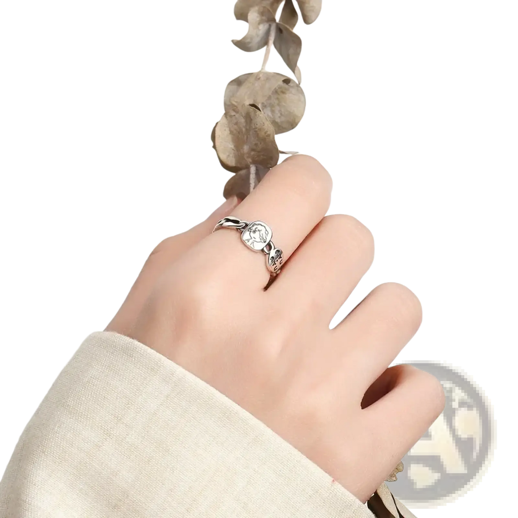 Jemmin sterling silver adjustable face ring with circular engraved design and delicate twisted band details