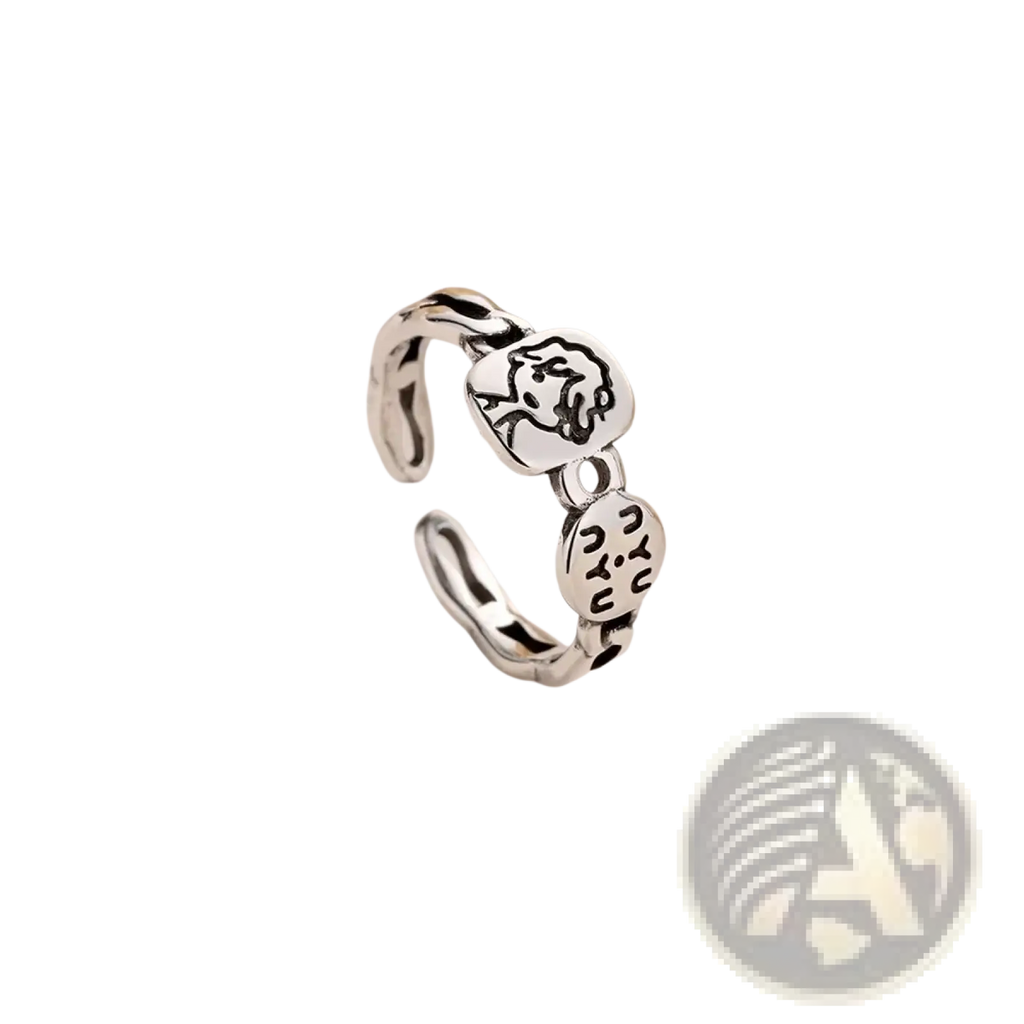 Silver adjustable open ring with two sterling silver circular charms engraved with a face and abstract symbols