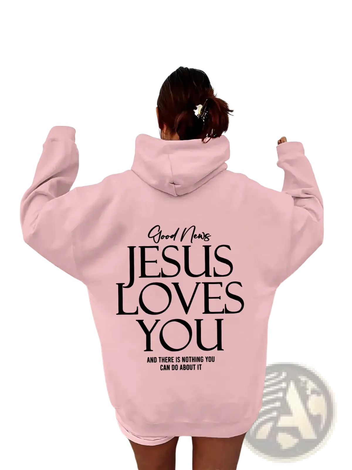 Pink oversized streetwear kangaroo pocket hoodie showing the back with black text good news jesus loves you and there is nothing you can do about it
