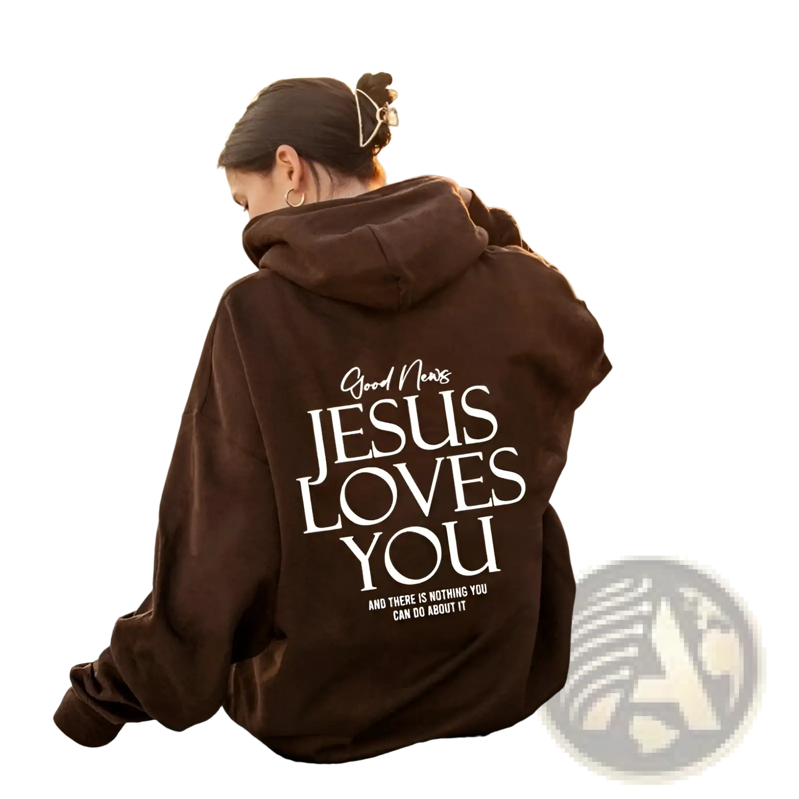 Brown oversized streetwear hoodie with kangaroo pocket featuring white text good news jesus loves you on front