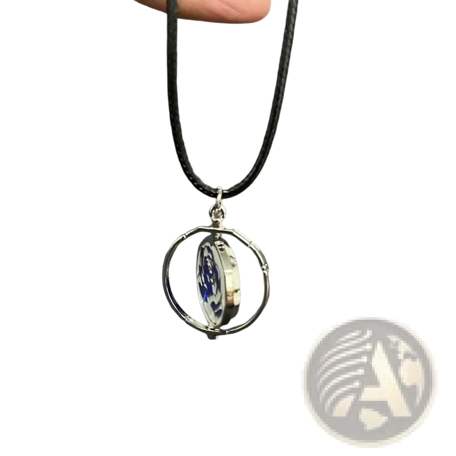 Silver-toned circular metal pendant with rotating blue and white porcelain disc on black cord for jinx cannon anime keychain