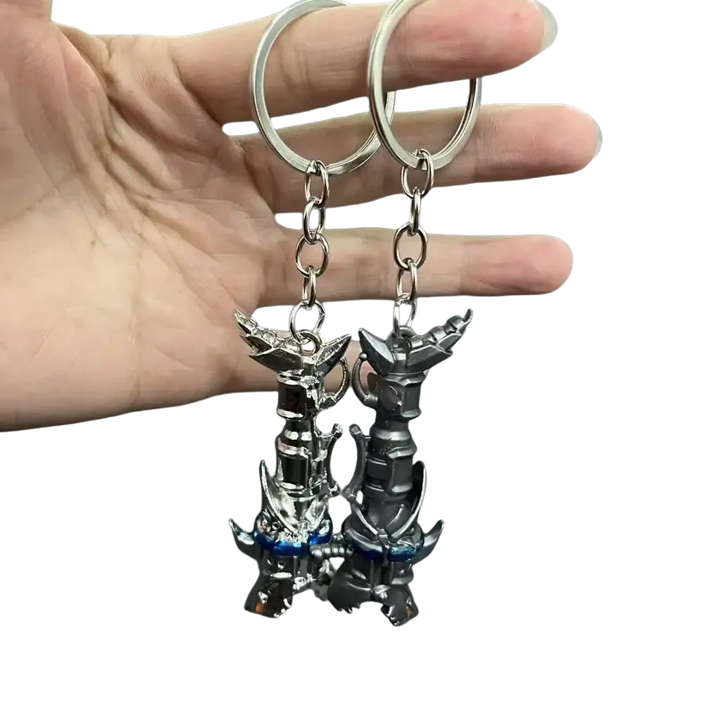 Two metallic jinx cannon anime keychains featuring detailed dark gray and silver robotic figures with blue accents