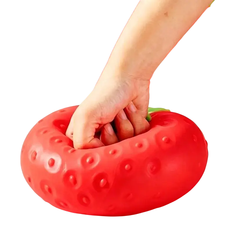Jumbo strawberry slow rising sensory fidget toy shaped stress ball with red textured surface and green leafy top