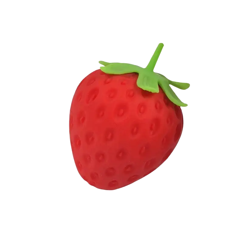 Jumbo strawberry slow rising sensory fidget toy in red textured rubber with green leafy top shaped like a strawberry stress ball