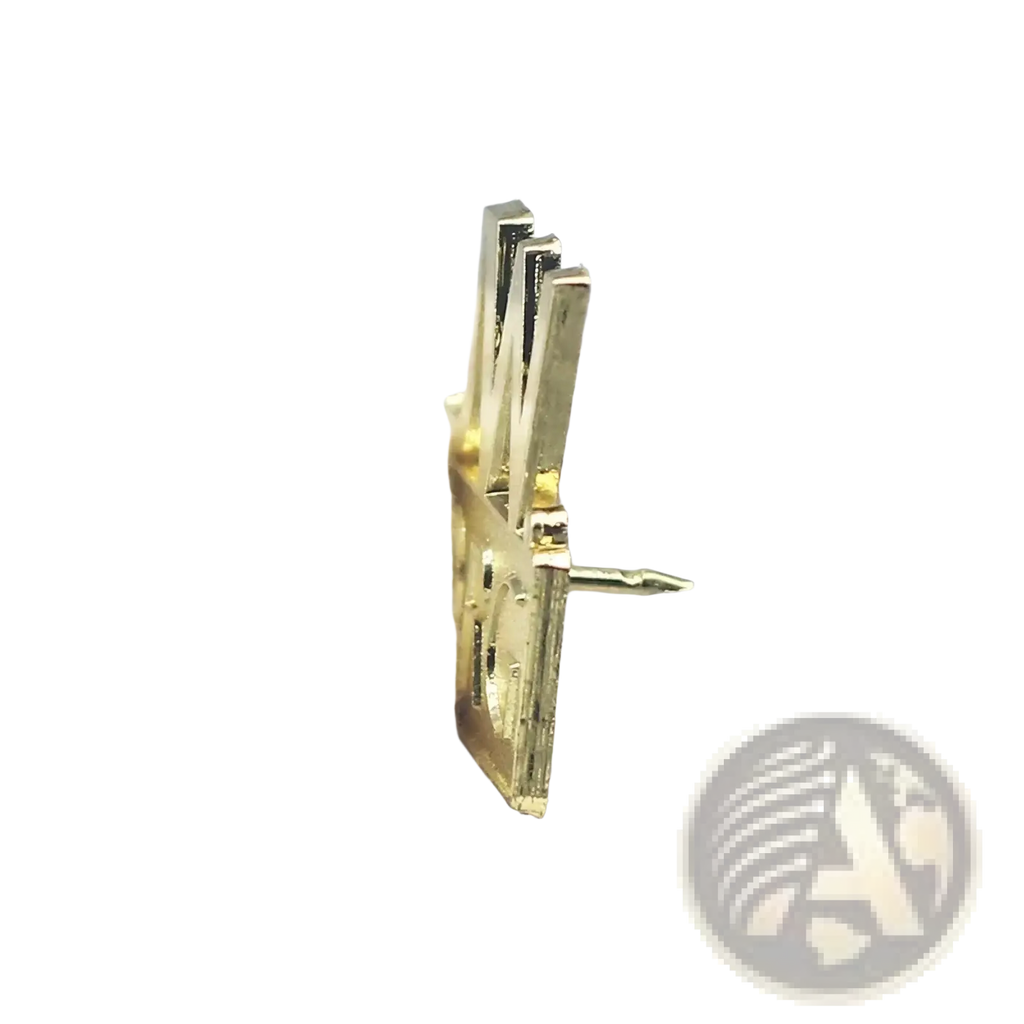 Gold-colored metal enamel brooch pin from jw.org set shaped like a stylized layered angular letter a