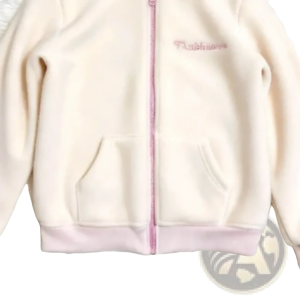 Cream-colored fleece zip-up hoodie with pink zipper and trim featuring subtle embroidered logo on chest