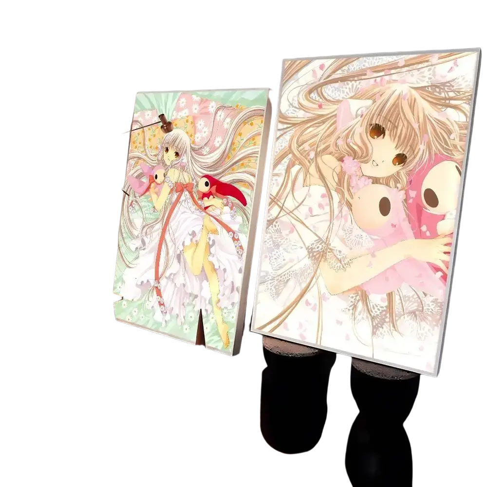 Two large kawaii girl cute anime wall art prints featuring long-haired female characters in pastel pink and white outfits