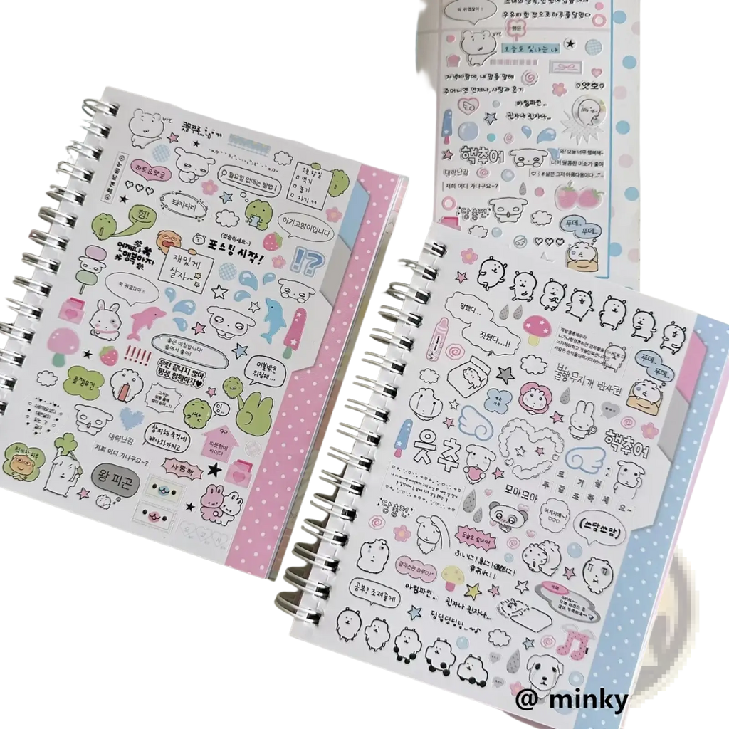 Pink and white polka-dotted spiral notebook with colorful kawaii kpop cartoon sticker sheets for stationery use