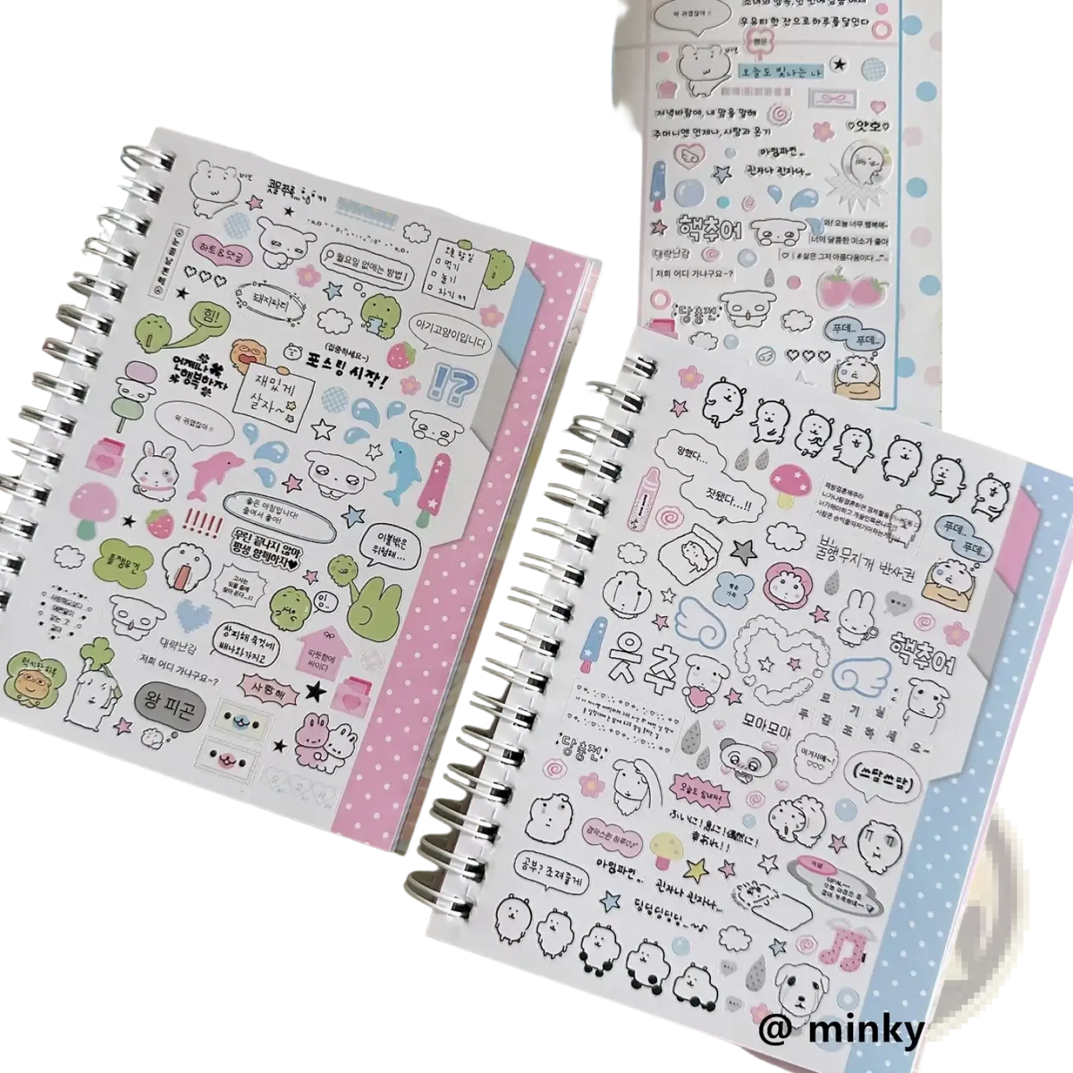 Pink and white polka-dotted spiral notebook with colorful kawaii kpop cartoon sticker sheets for stationery use