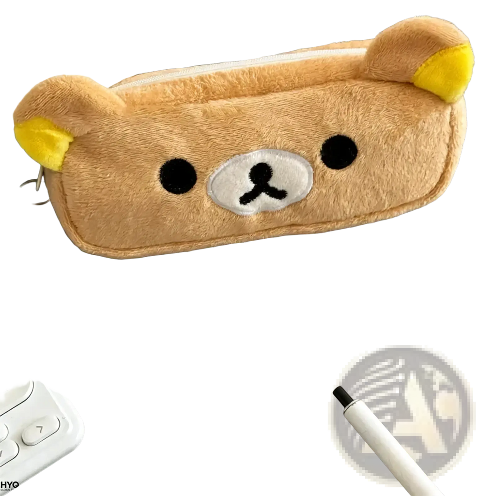 A plush tan Kawaii Rilakkuma pencil case with yellow-tipped ears and embroidered black eyes on a white snout