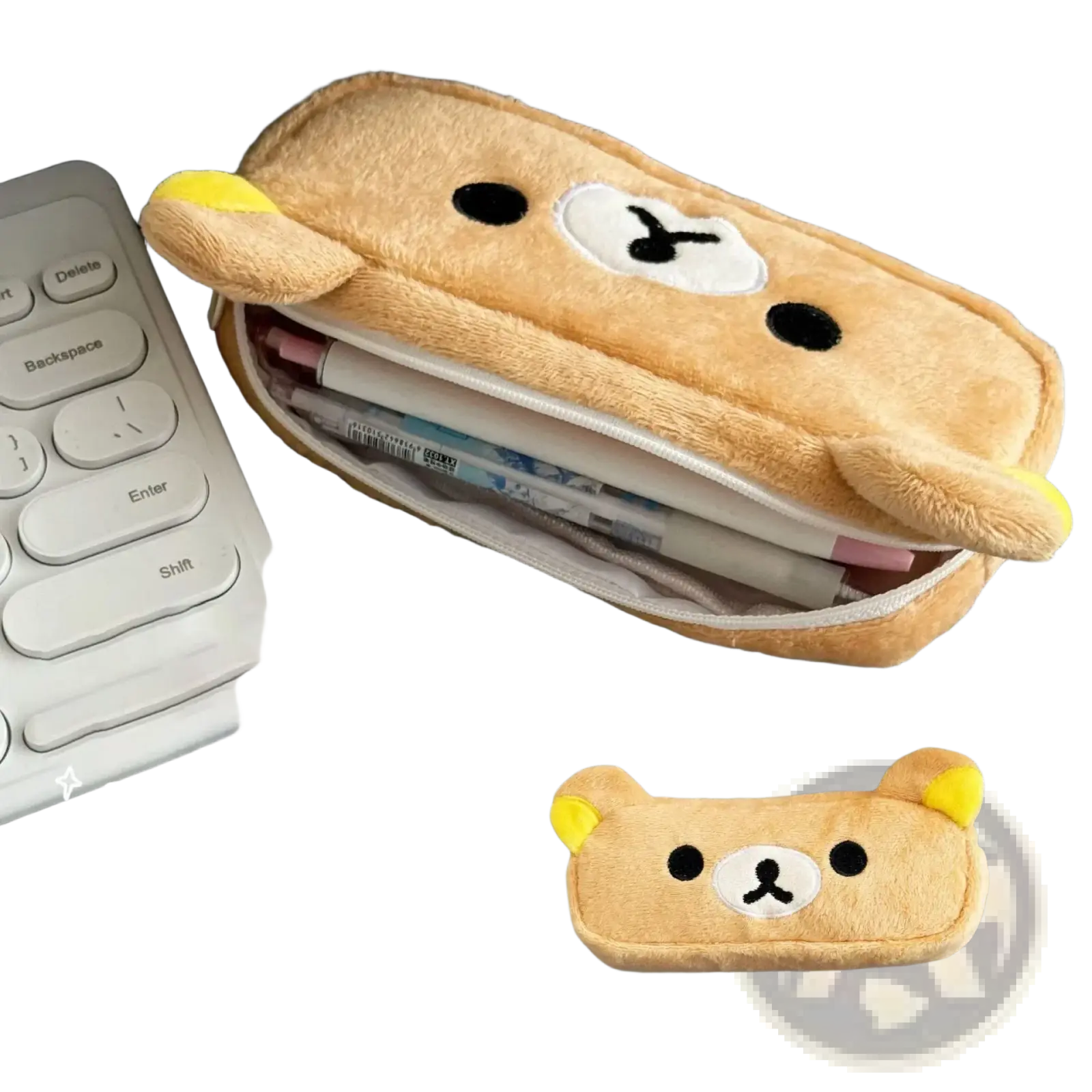 A kawaii rilakkuma plush pencil case in tan color with soft fur texture and embroidered black eyes and white nose