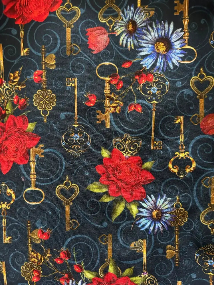 Dark blue cotton fit and flare dress with a vintage keys and roses pattern featuring gold keys red roses and blue daisies