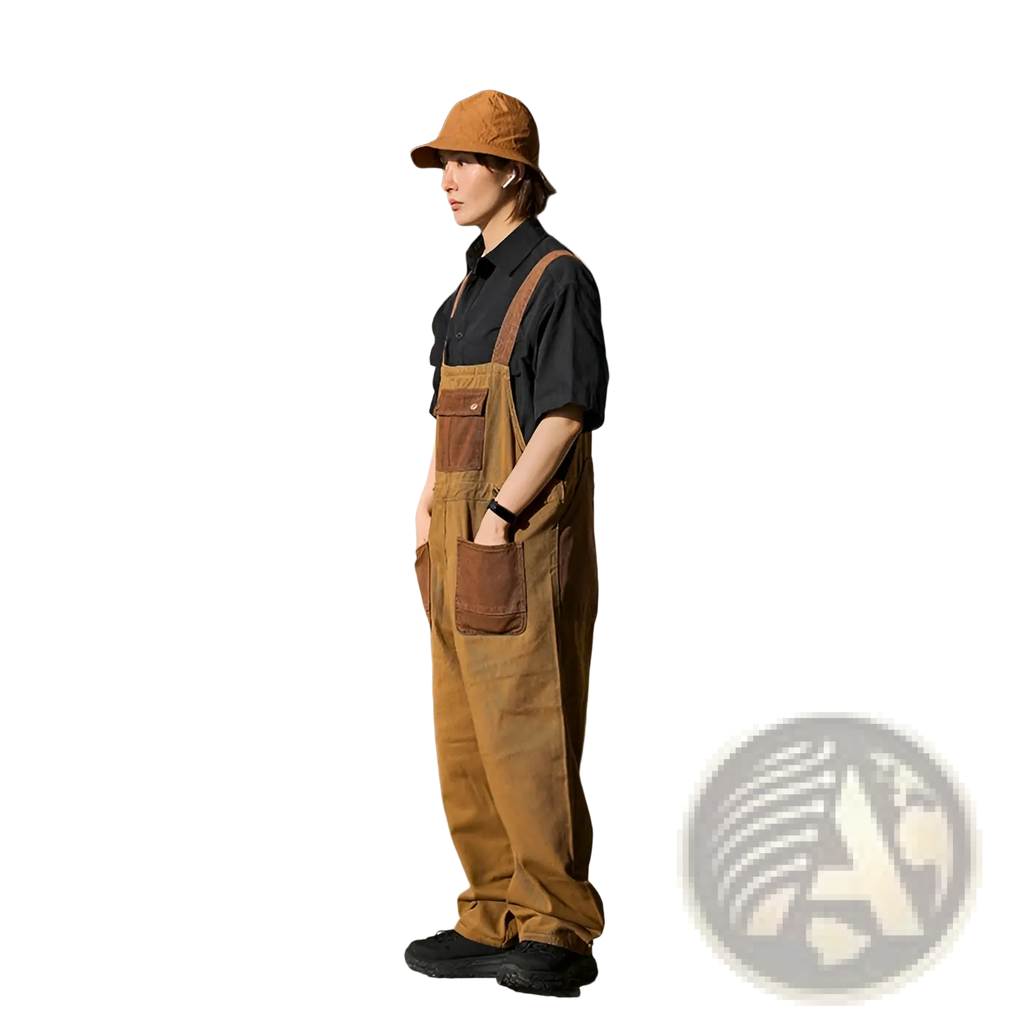 Khaki retro suspender overalls in tan canvas with brown leather patches and adjustable straps shown from the front