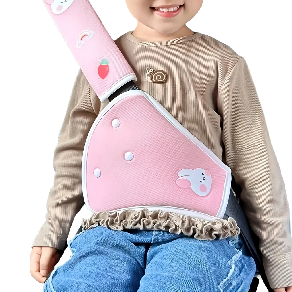 Pink kids car seat belt cover with cartoon designs and ruffled edge paired with panda neck support pillow