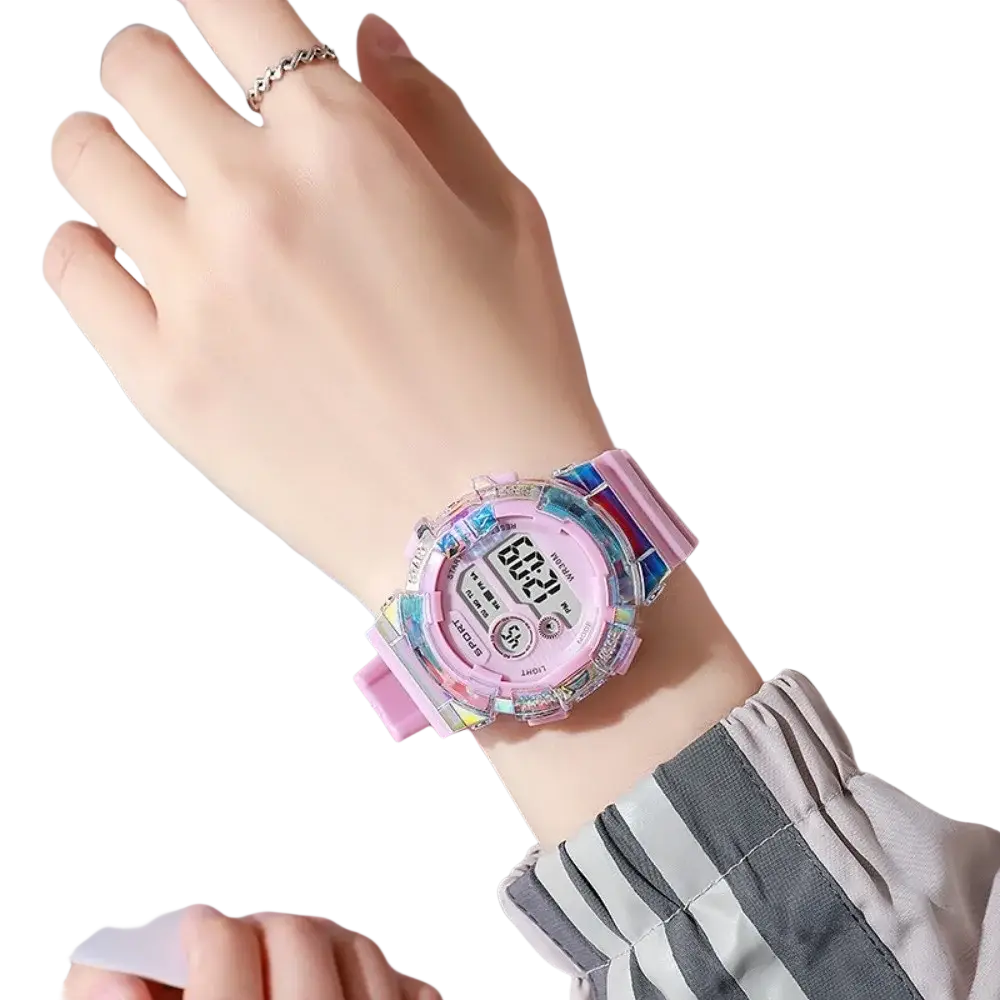 Pink kids digital sports watch with translucent rainbow resin case and silicone band material battery included