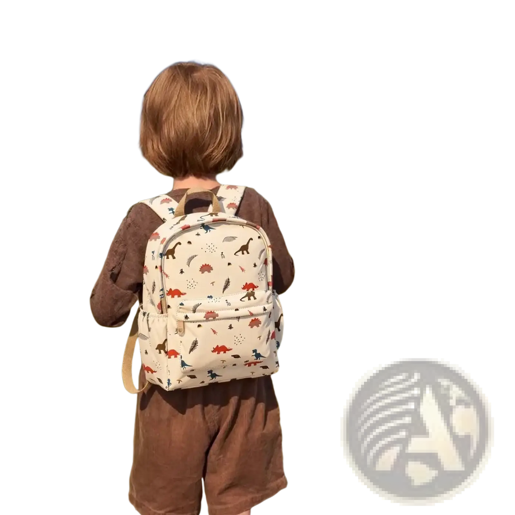 Cream-colored kids dinosaur backpack with a playful pattern of colorful dinosaurs and feathers for school use