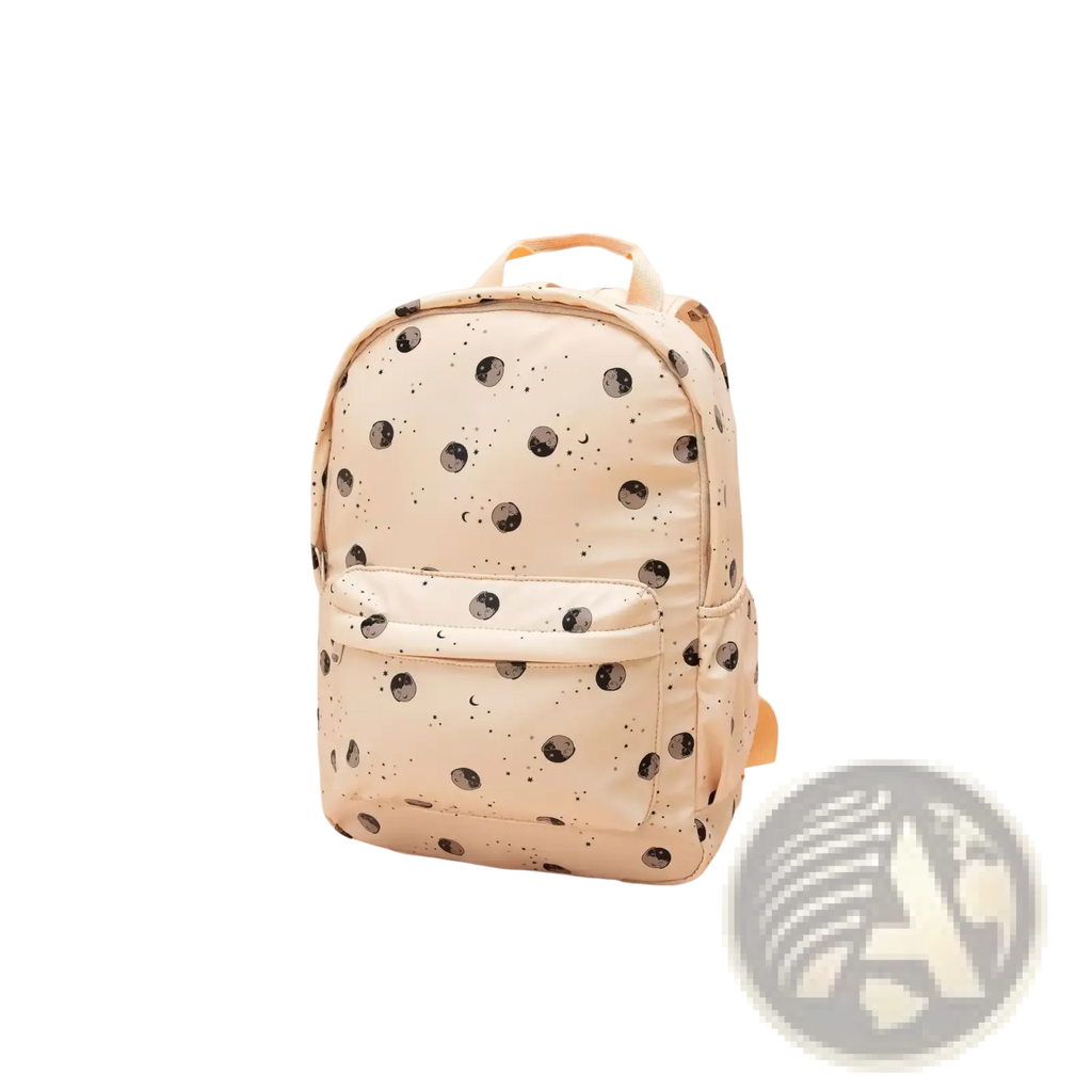 Cream-colored kids dinosaur backpack with black moon and star patterns pastel school bag front view