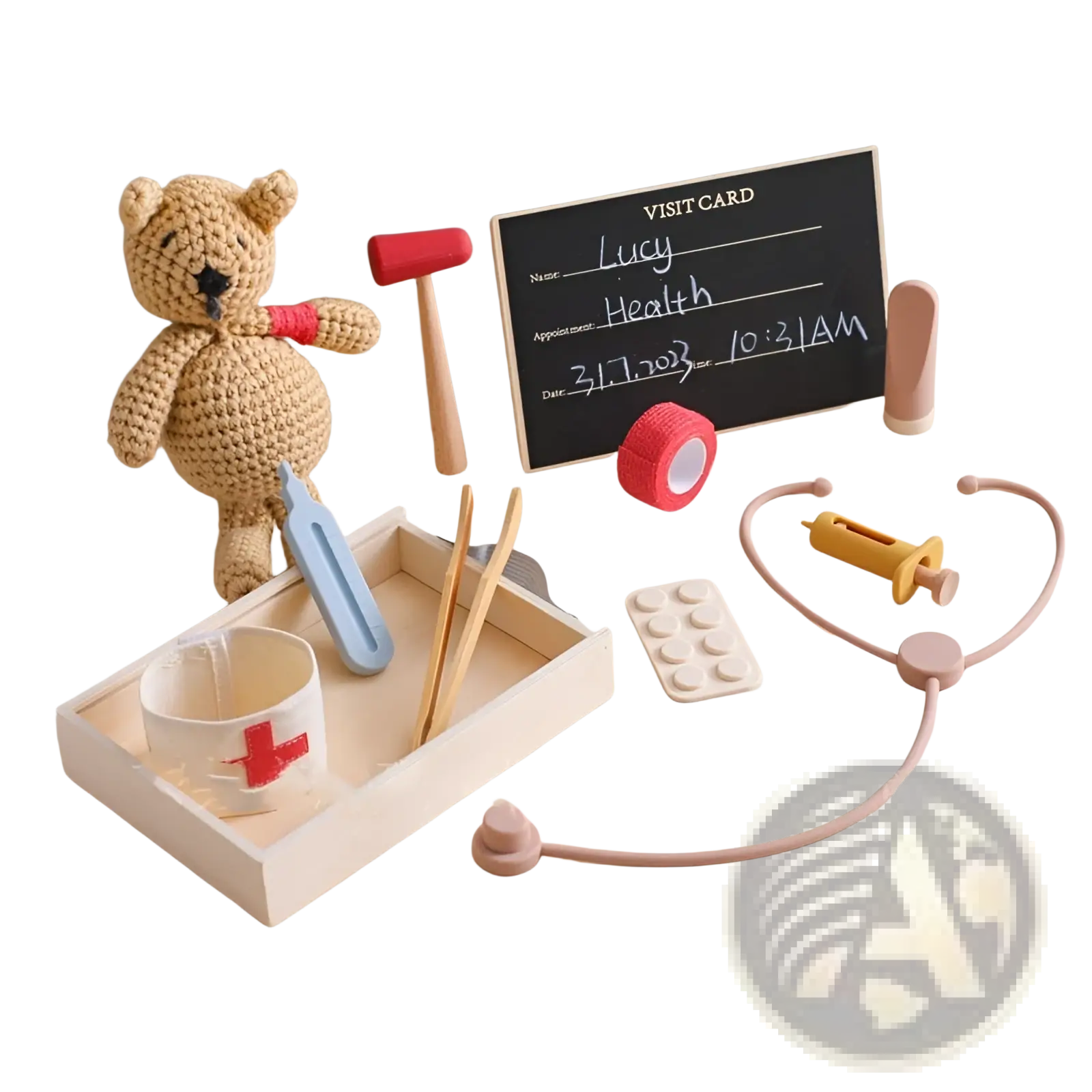 A beige crocheted teddy bear with a black nose and red wristband in a kids doctor kit wooden and silicone medical toy set