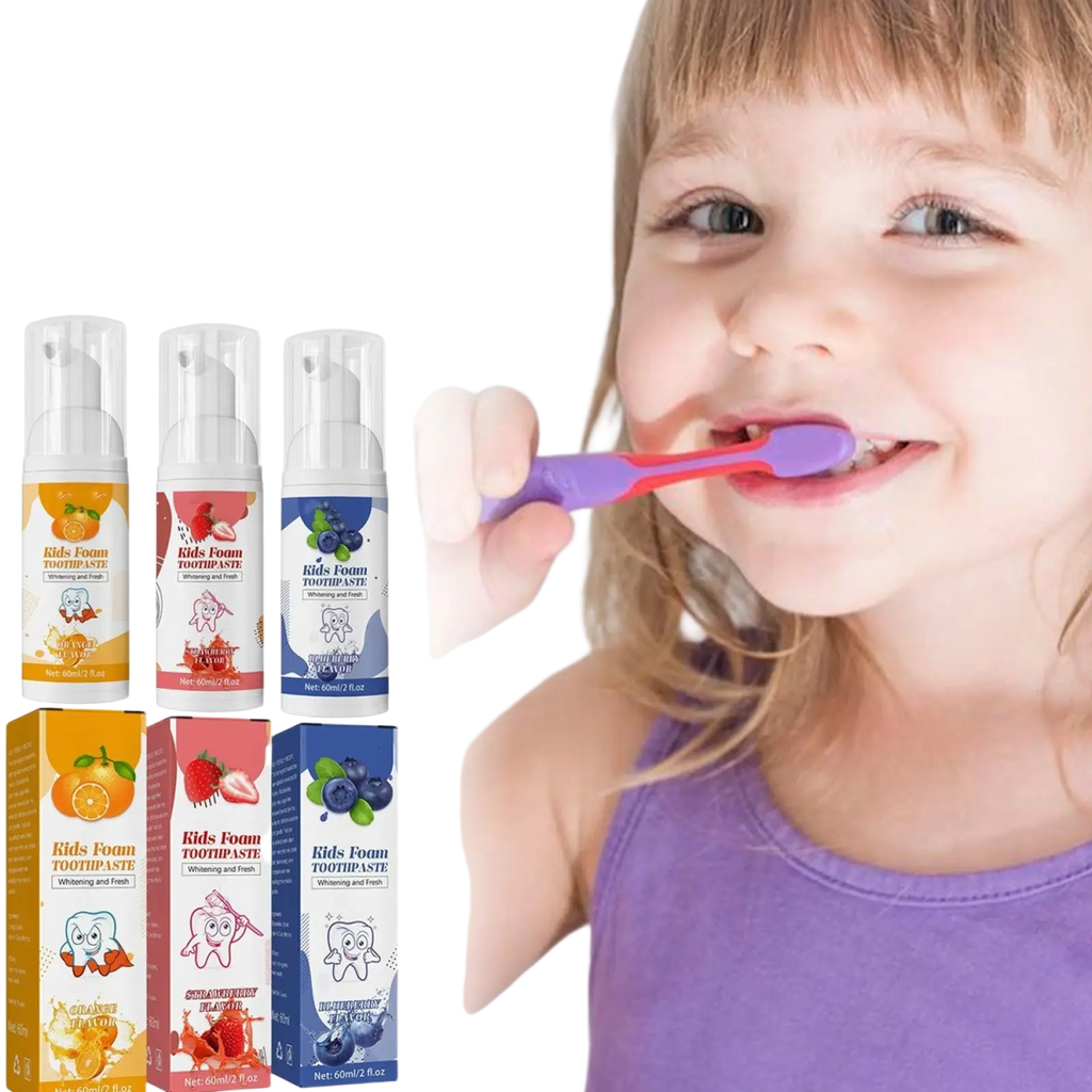Three bottles of kids foam toothpaste in orange strawberry and blueberry flavors with pump tops for cavity protection