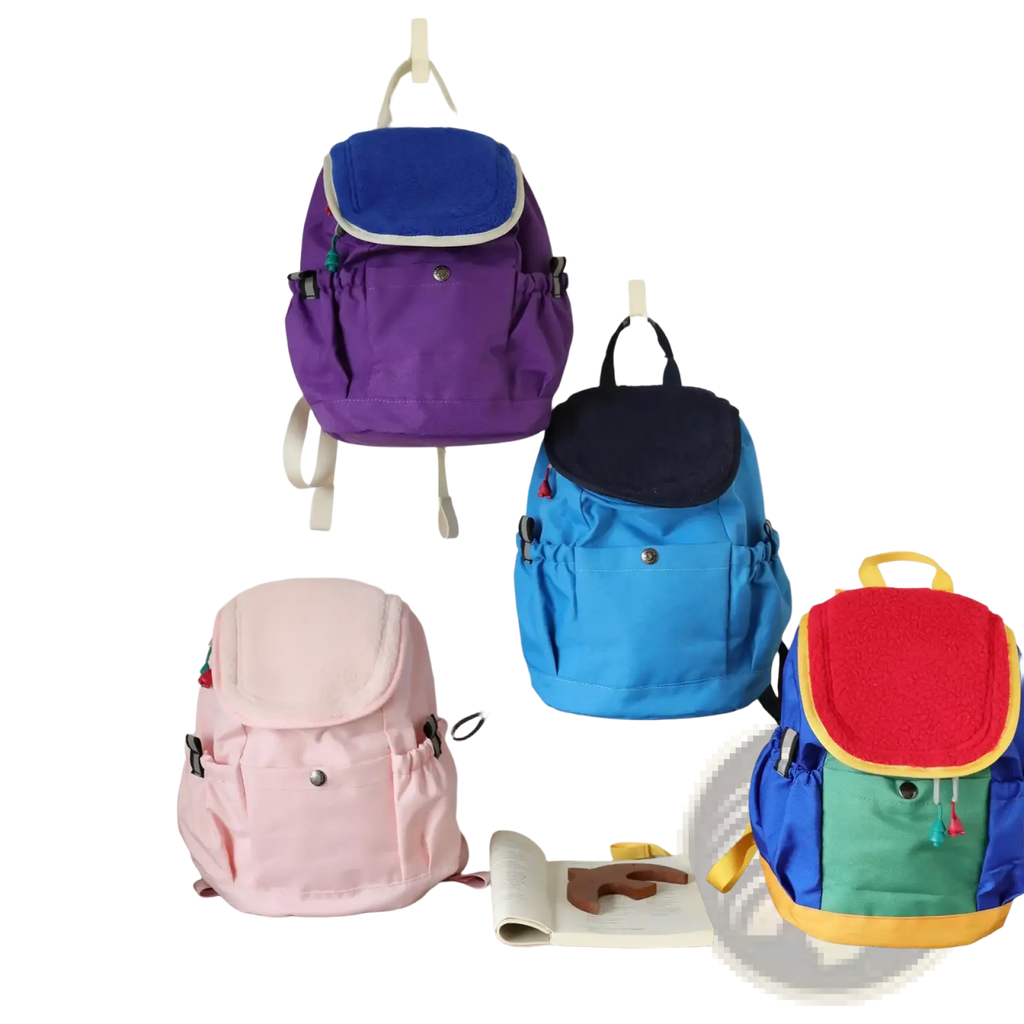 Kids lightweight fuzzy backpack in purple with blue top flap and white trim for kindergarten daypack use