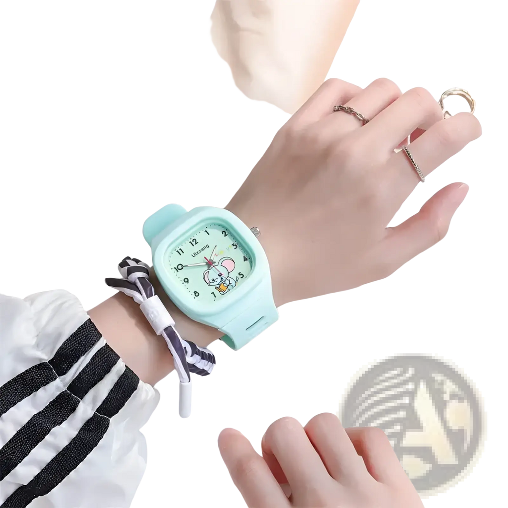Kids luminous cartoon elephant digital watch in mint green silicone with a cartoon mouse design on the face