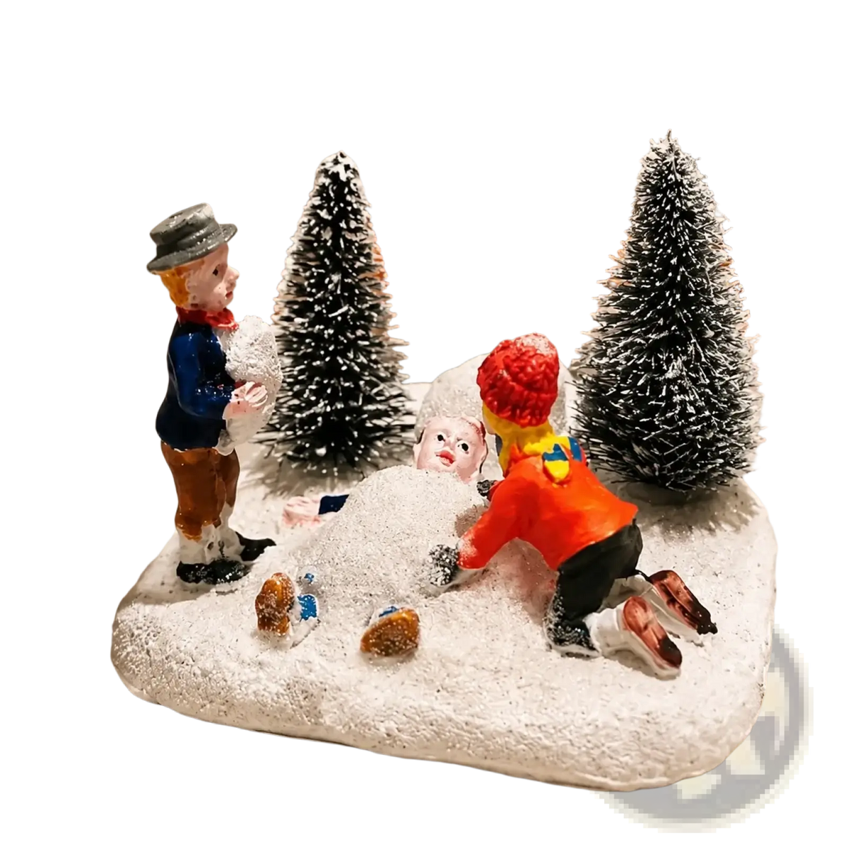 Kids playing snow Christmas village figurine set with three winter-clad characters and snow-covered trees on base