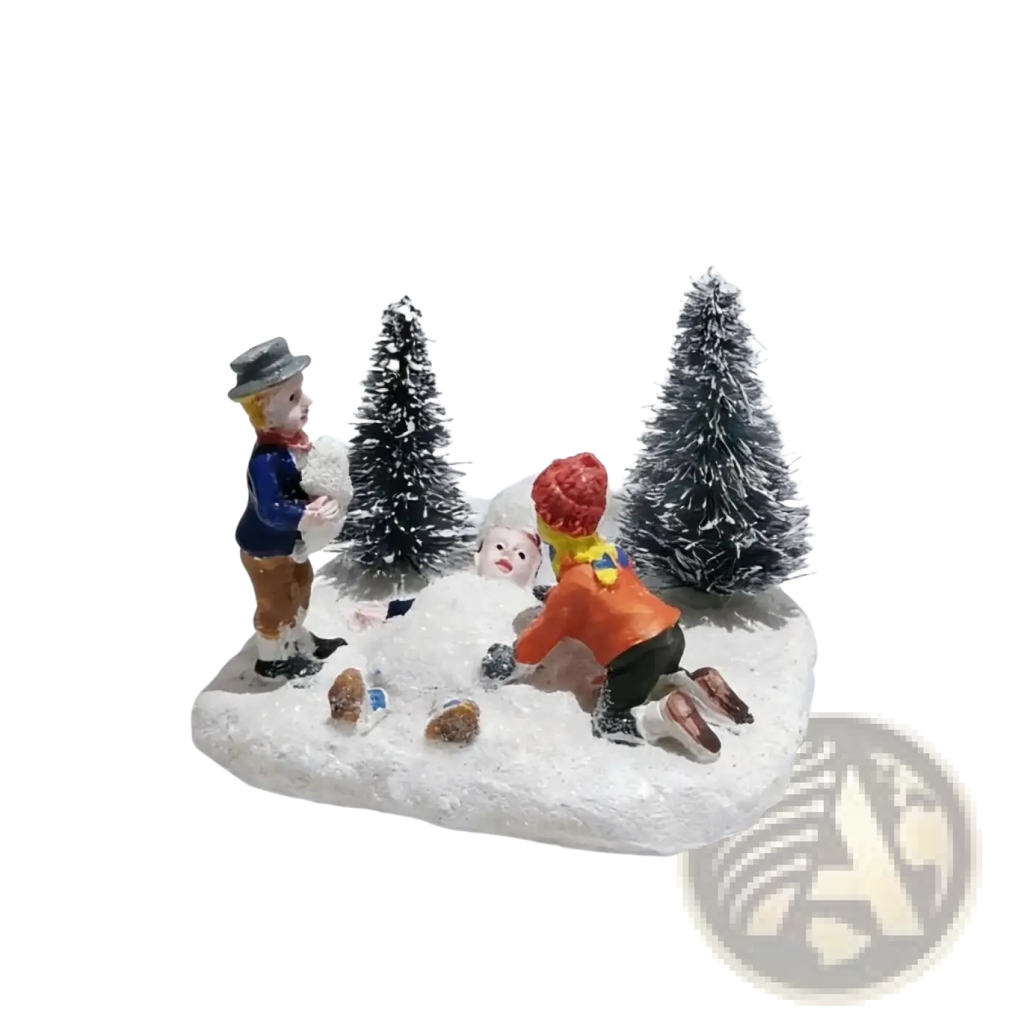 Kids playing snow christmas village figurine set with two children, snowman, tiny trees, and houses on a snowy base