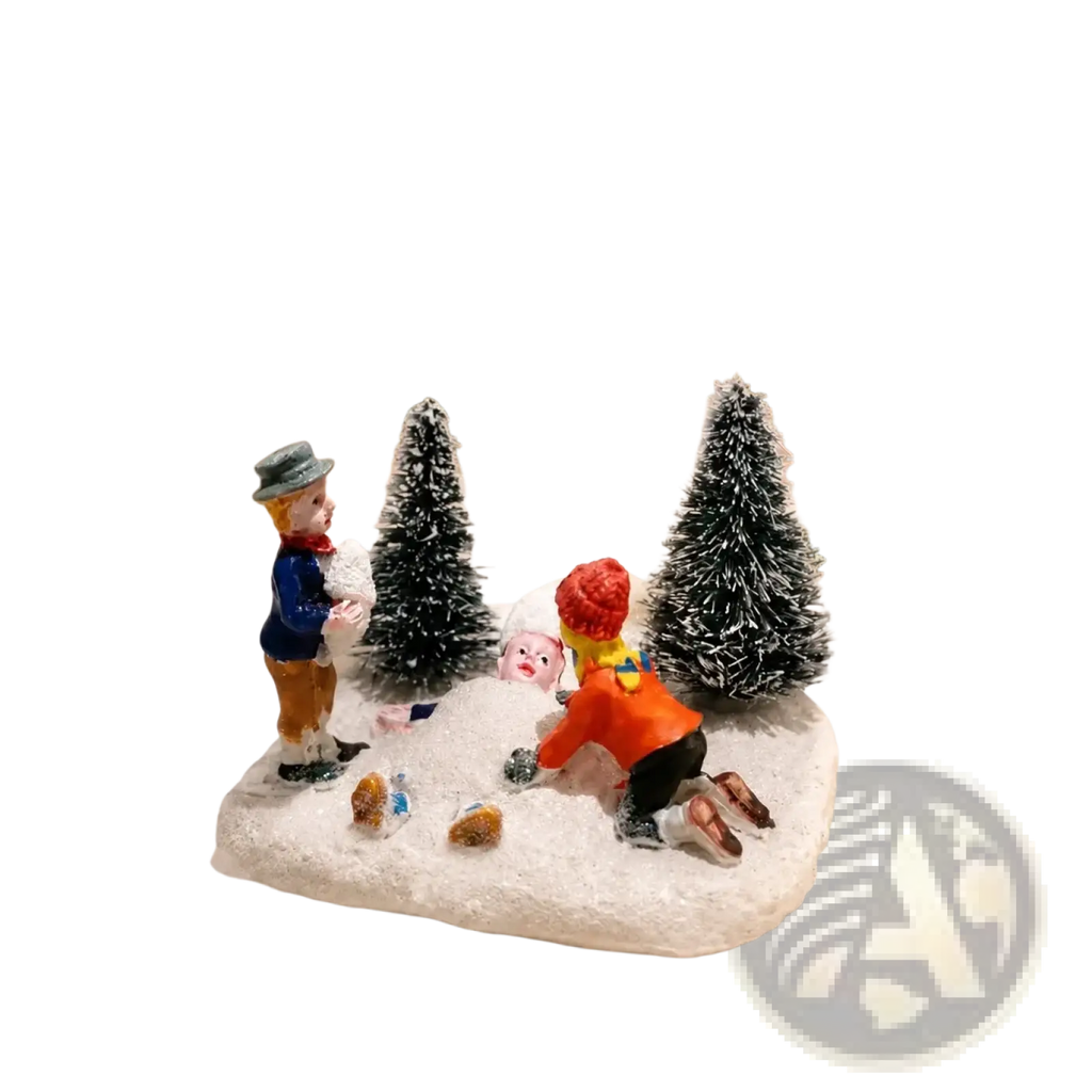 Kids playing snow christmas village figurine featuring two children building a snowman in a festive snowy village scene