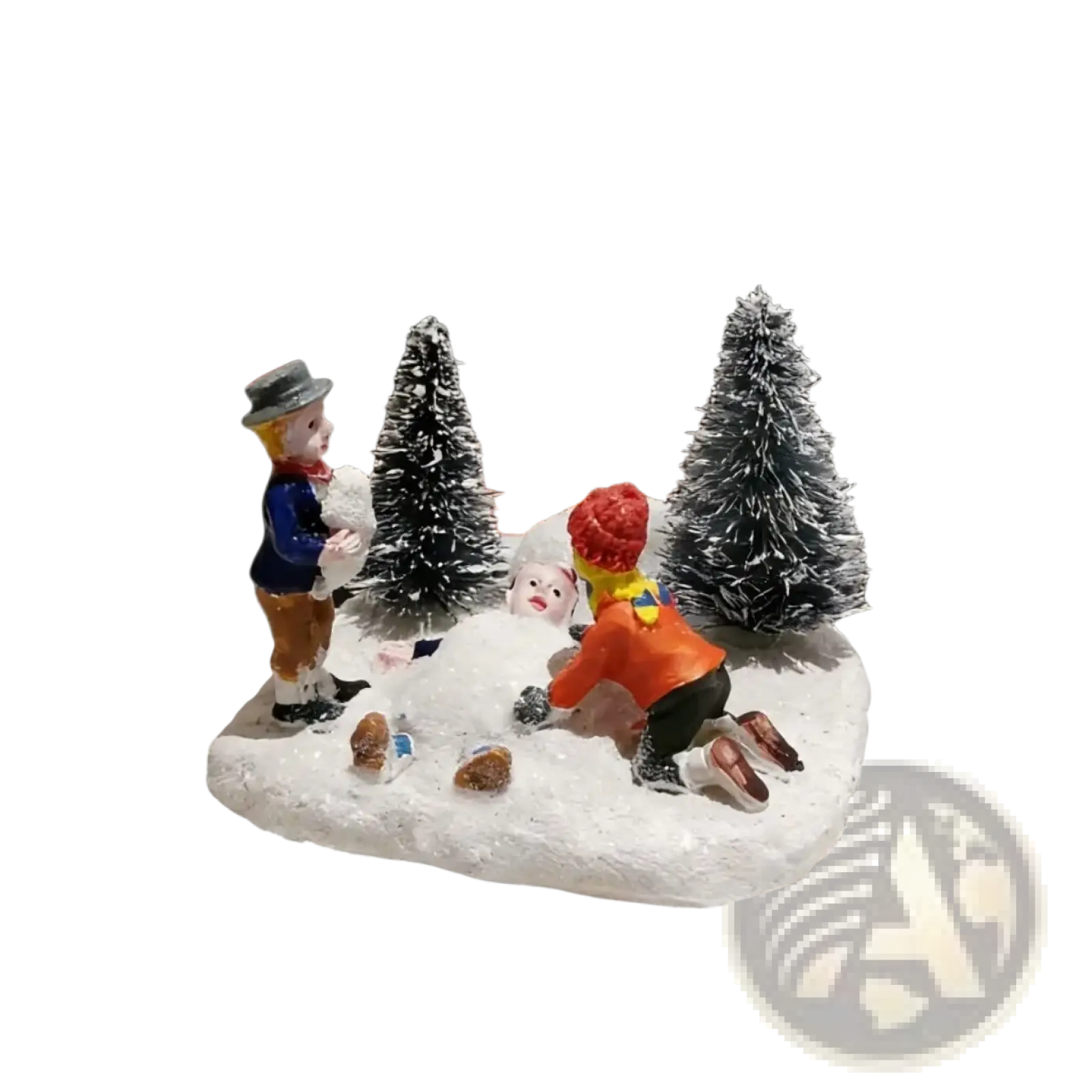 Kids playing snow christmas village figurine set with two children and snowman in snowy terrain with frosted pine trees