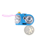 Blue plastic kids projection camera with silver accents smiling face lens and pink wrist strap educational toy
