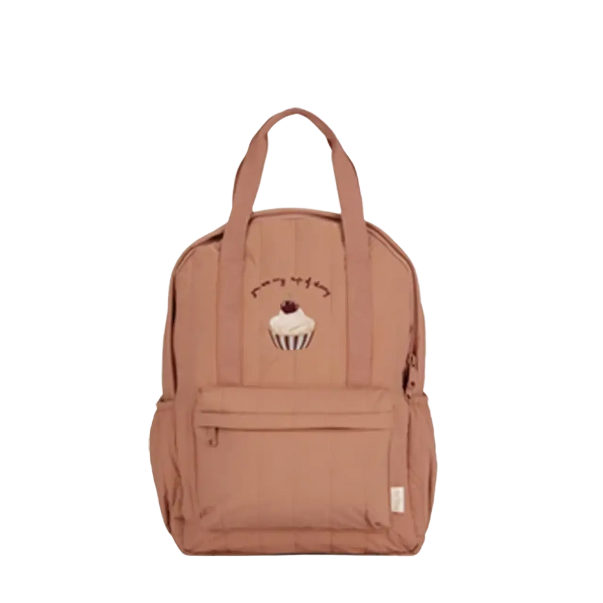 A soft taupe kids quilted embroidered backpack with cupcake patch designed as a waterproof school bag