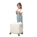 Kids ride-on spinner suitcase travel trolley bag in off-white hard-shell design with sleek modern look and four spinner wheels