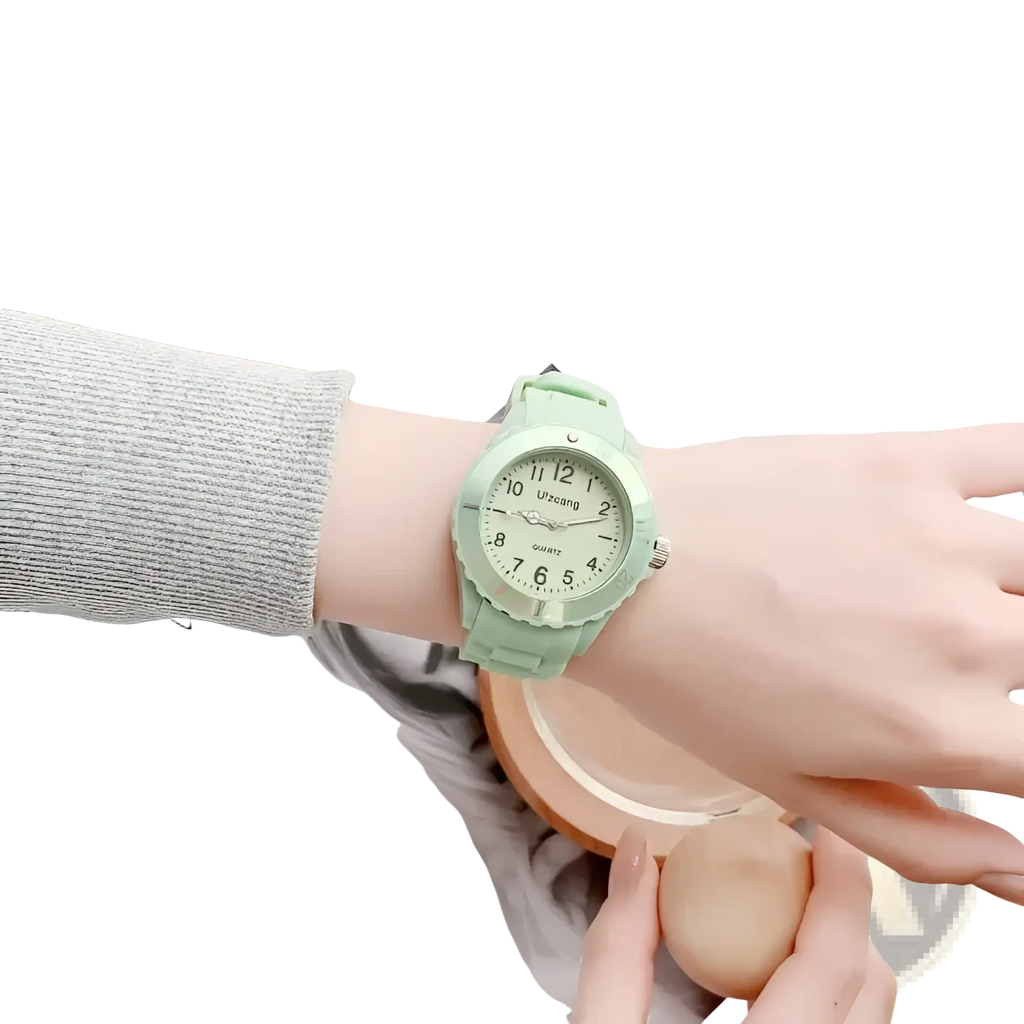 Kids silicone quartz watch featuring mint green silicone band and white face with black numerals for colorful wear