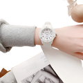 White kids silicone quartz watch with minimalist dial and black numerals in a colorful jelly wristwatch design
