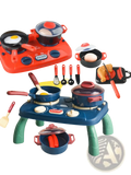 Red and blue plastic kids toy kitchen set with green legs and cooking utensils including pots and pans for imaginative play