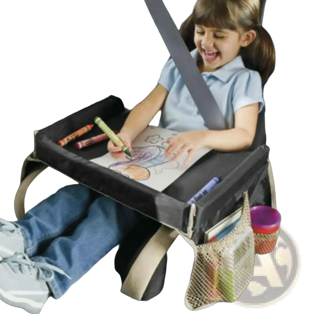 Black fabric kids travel tray for car and airplane with mesh side pockets and beige straps shown from back side