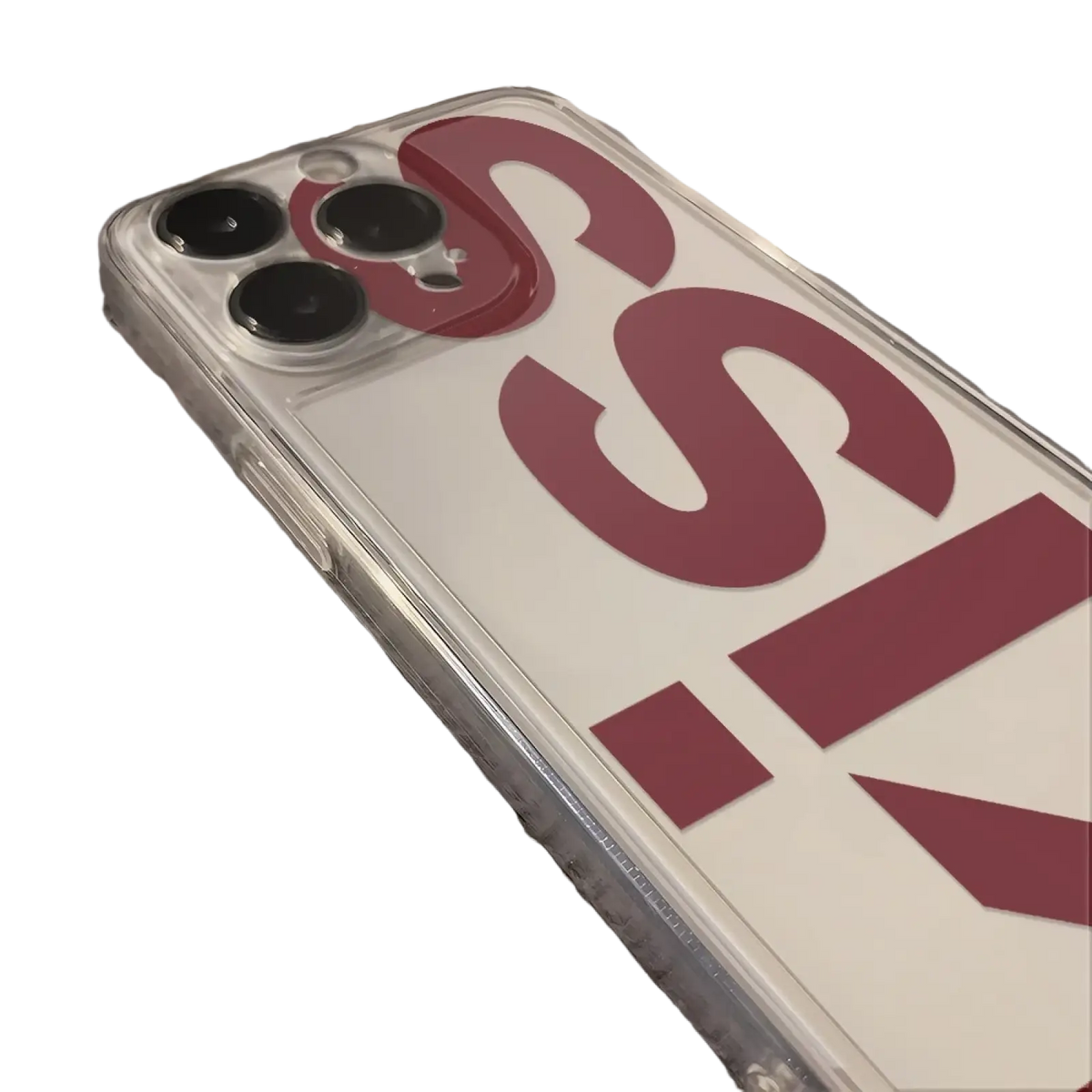 Clear silicone kiss iphone case with bold red lettering on the back against a white background