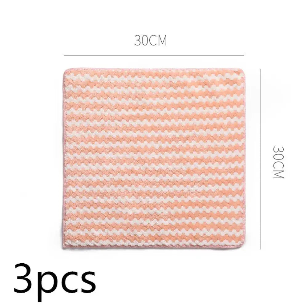 A 30cm by 30cm super absorbent pink and white zigzag coral fleece kitchen cleaning cloth with textured fabric