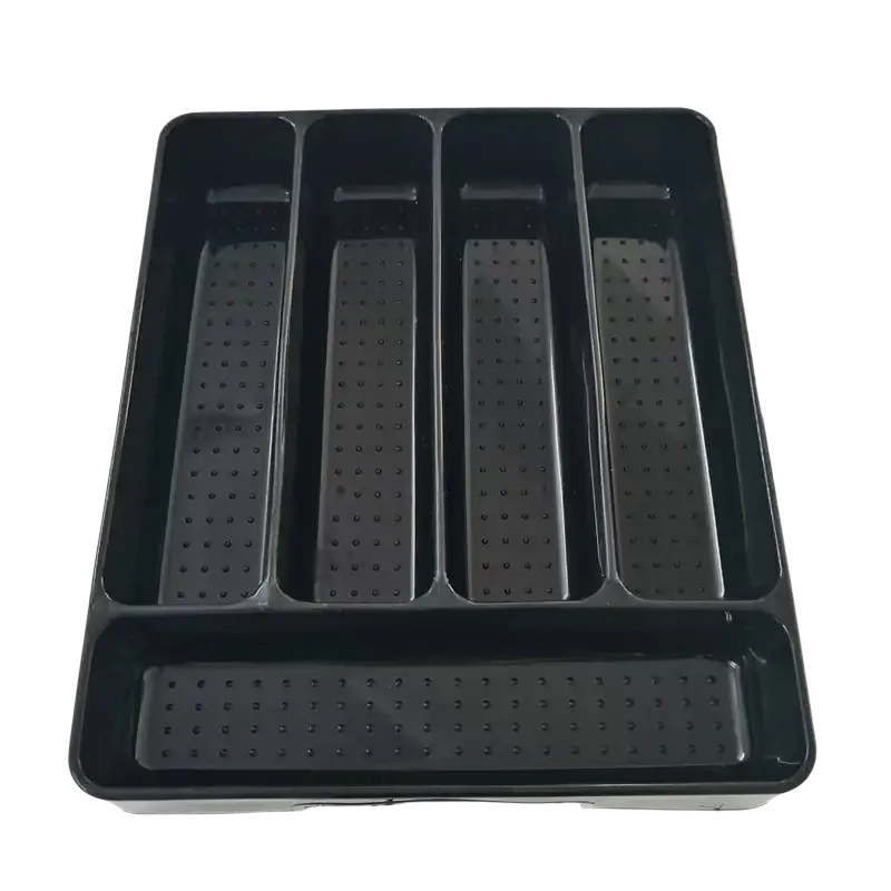 Black plastic kitchen drawer adjustable utensil organizer tray with five textured compartments including one larger slot
