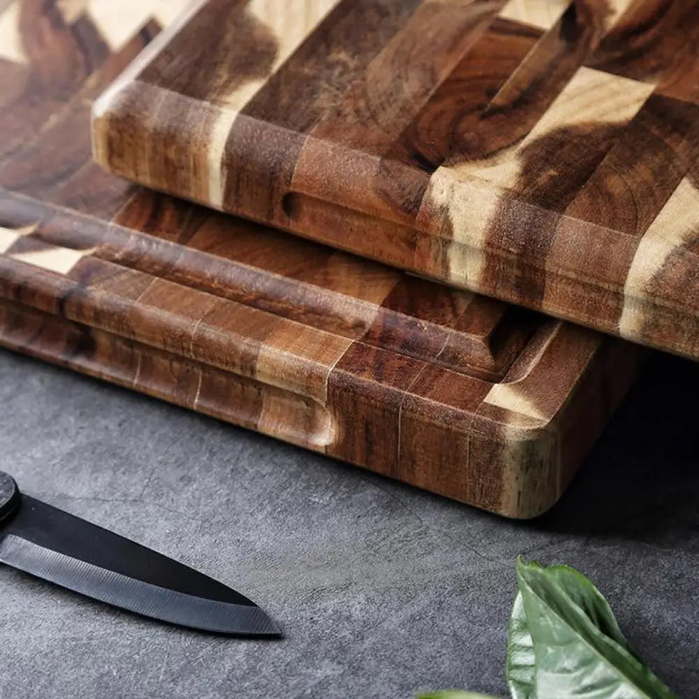 Striped parquet solid wood cutting board with sturdy construction and rich dark brown and natural wood tones